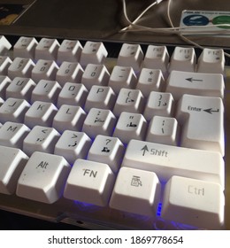 Close up white computer keyboard from high angle