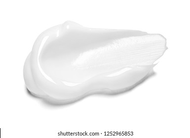 close up of  a white cream sample on white background