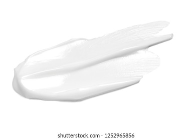 close up of  a white cream sample on white background - Shutterstock ID 1252965856