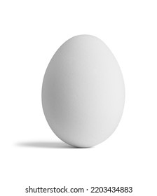 Close up of a white egg on white background
