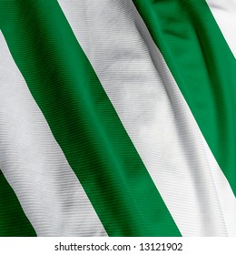 Close Up Of A White And Green Colored Flag