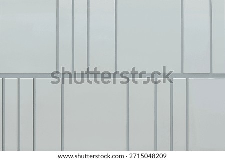 Close up of white grey panel with linear grouts. Suitable for modern contemporary wall accent design. Seamless background texture.