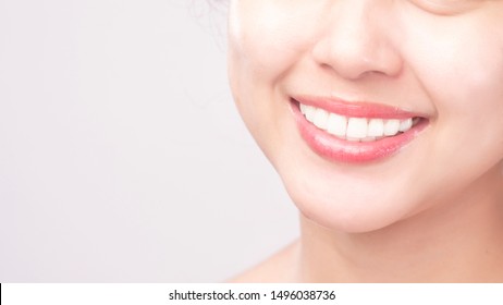 Close Up Of  White Healthy Teeth Of Beautiful Smile Young Woman 