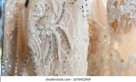 Close Up Of White Lace Wedding Dress