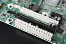 Close Up White PCI Slot On Computer Motherboard. 