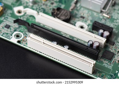 Close Up White PCI Slot On Computer Motherboard. 