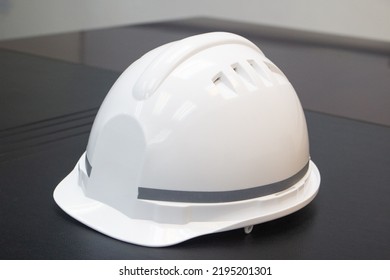 Close Up Of A White Safety Helmet (hard Hat) On The Table, Hong Kong