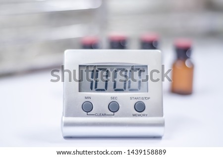 Close up White timer clock in laboratory.