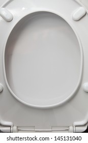 Close Up White Toilet Seat As Background