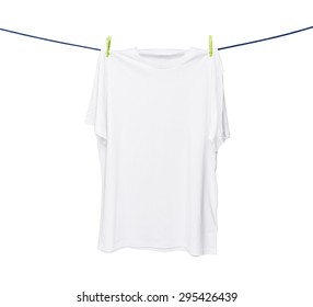 Close up of a white t-shirt on the rope. Isolated on white background. - Shutterstock ID 295426439
