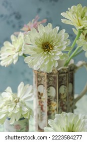 Close Up Of White Zinnia In Vase