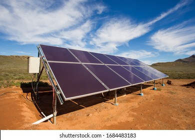 Close Up Wide Angle View Of Photovoltaic Solar Panels On An Off The Grid Electricity Instalation On A Farm In The Karoo Outside Touwsrivier In The Western Cape Of South Africa