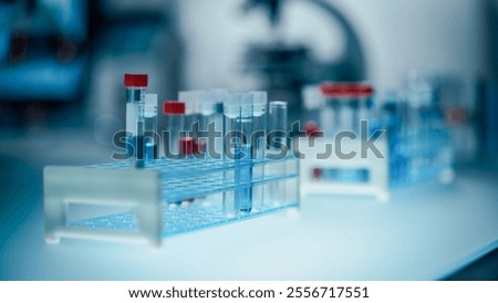 Close Up of a Wide Range of Test Tubes with Different Colorful Chemicals, Acids, Mixtures Standing on a Laboratory Table. Anonymous Scientist Preparing for an Experiment for Clinical Trials