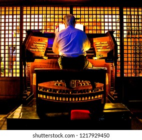 Close Up Wiew Of A Organist Playing A Organ