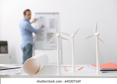 Close up of wind turbines models on engineers table