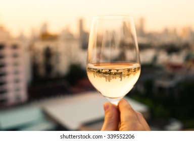 Close up of wine glass in the city
