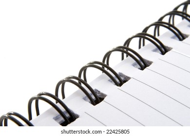 Close Up Of Wire Bound Notebook On White Background