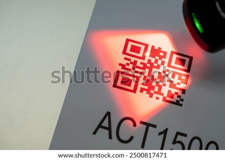 Close up wireless barcode reader to read barcode with red laser light to check the accuracy of barcode. Logistics, Import.
