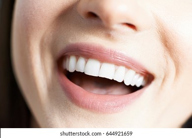 Close Up Of Woman With Beautiful Teeth And A Perfect Smile