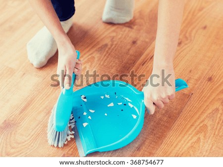 Similar – Image, Stock Photo Hand brushes to sweep and broom handle hanging on the wall in a storage room