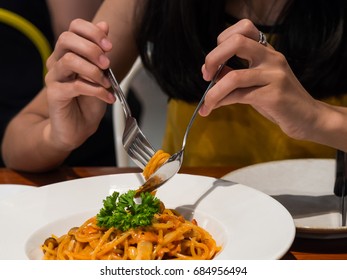 Close Up Of Woman Eating Spaghetti