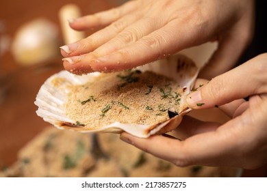 Close Up Woman Hand Flatten Texture Mix On Seashell In Kitchen. Gourmet Home Cooking Special Meal Experimental Concept