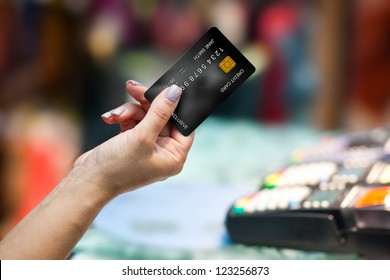 close up of woman hand holding credit card