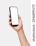 Close up of woman hand holding modern smart phone mockup. New modern black frameless smartphone mockup with blank white screen. Isolated on white background high quality studio shot