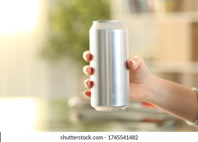 Close Up Of Woman Hand Holding A Soda Drink Can At Home