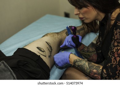 Close Up Woman Hand With Latex Glove, Applying Vaseline To A Tattoo