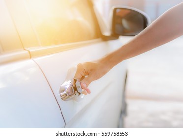 Close Up Woman Hand Opening White Car Door.