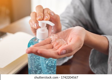 Close Up Woman Hand Press Pumping Alcohol Gel To Cleaning Her Hand.