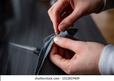Close up of woman hand sewing