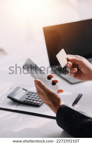 Close up of woman hand using credit card and laptop for payment and online shopping, Online shopping, payments digital banking, E-commerce concept.
