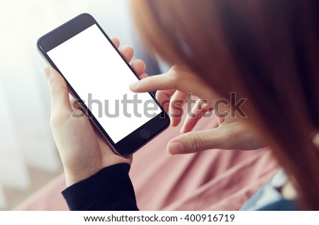 Similar – Image, Stock Photo Detail of hands texting with mobile phones green and blue with computers behind. Messaging apps.