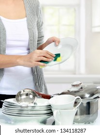 close up of Woman hand Washing Dishes in the kitchen