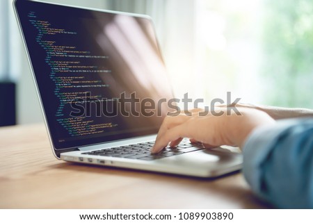 Close up Woman hands coding html and programming on screen laptop, development web, developer.