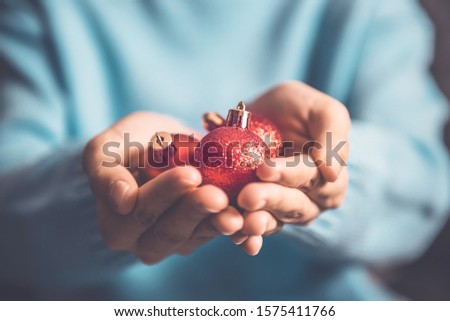 Similar – Woman holds strawberries in her hands