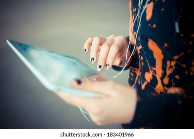 Close Up Of Woman Hands Using Tablet Outdoors