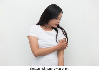 Close up woman having pain in injured elbow.
 - Shutterstock ID 1942614469