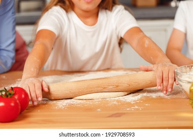 Close Up Of Woman With Her Child Kneading Dough