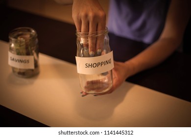 Close Up Of Woman Holding Empty Jar.