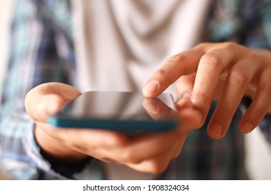 Close Up Of Woman Holding And Using Smart Mobile Phone, Scrolling Browsing Internet On Gadget Concept