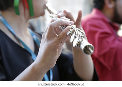 Close Up Of A Woman Playing The Western Concert Flute