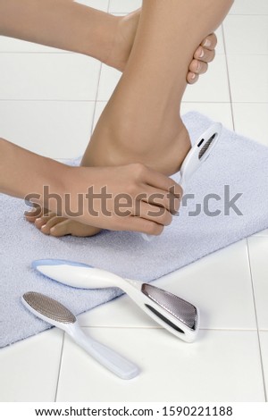 Close up of woman receiving pedicure