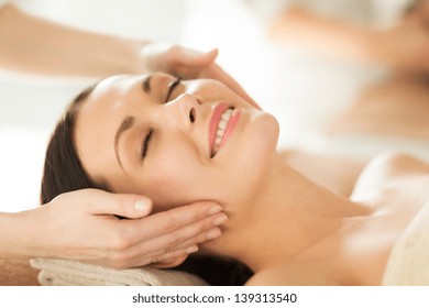 close up of woman in spa salon getting face treatment - Powered by Shutterstock