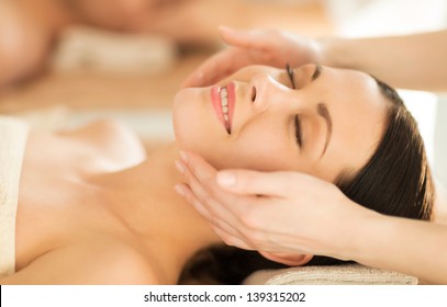 Close Up Of Woman In Spa Salon Getting Face Treatment