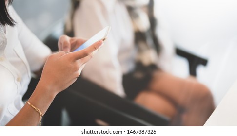 Close up of woman surfing the internet for new information in meeting room - Shutterstock ID 1467387326