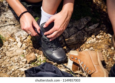 Close Up Woman Tying Hiking Boots