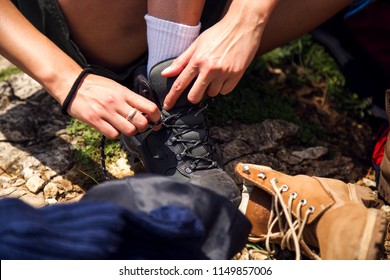 Close Up Woman Tying Hiking Boots